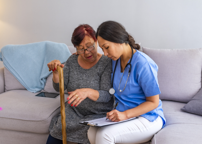 Home care worker with elderly patient