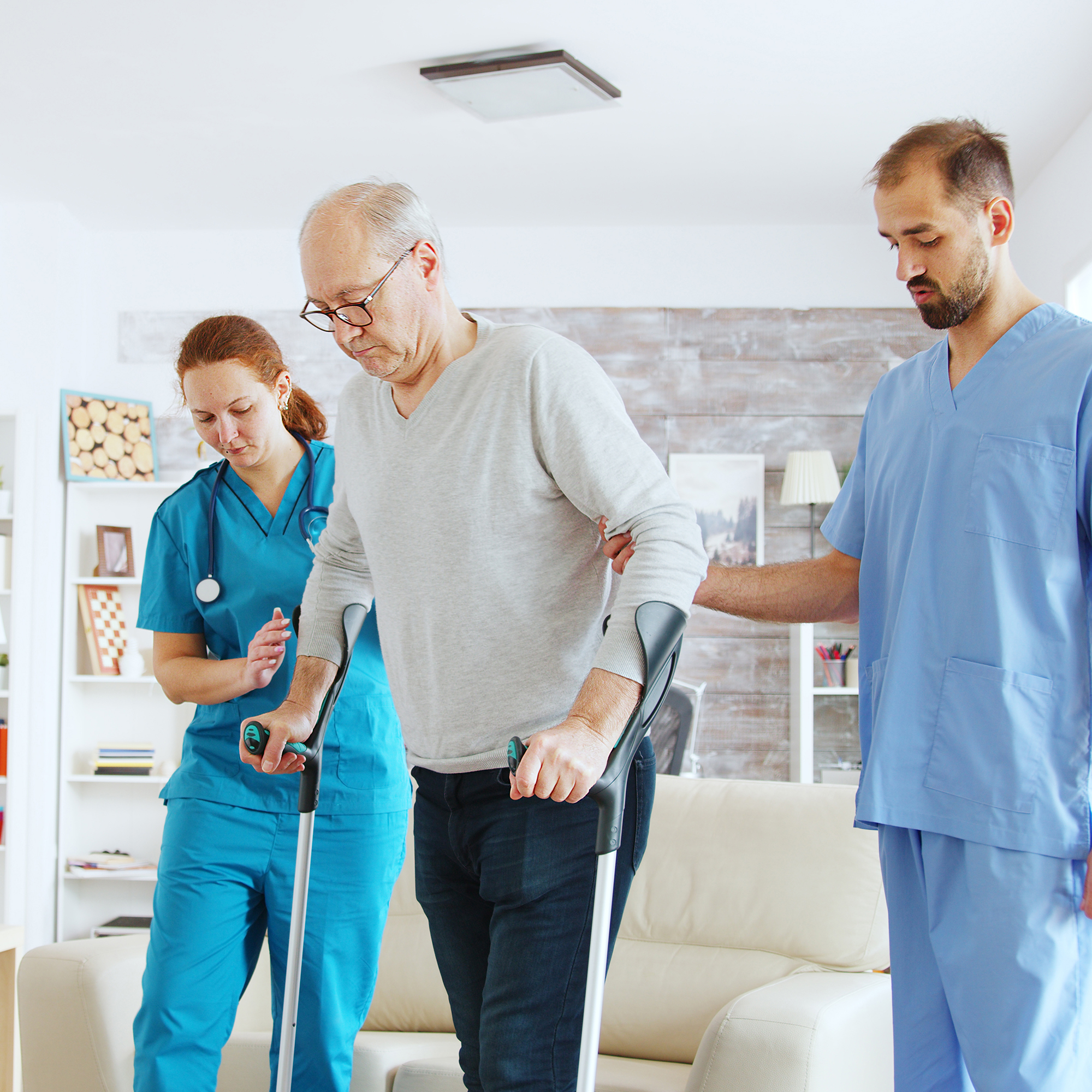 Nurses and support workers helping in a long-term care home